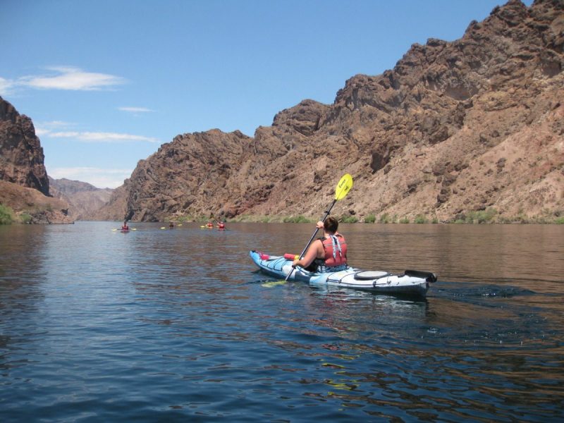 a person kayaking along the colorado river