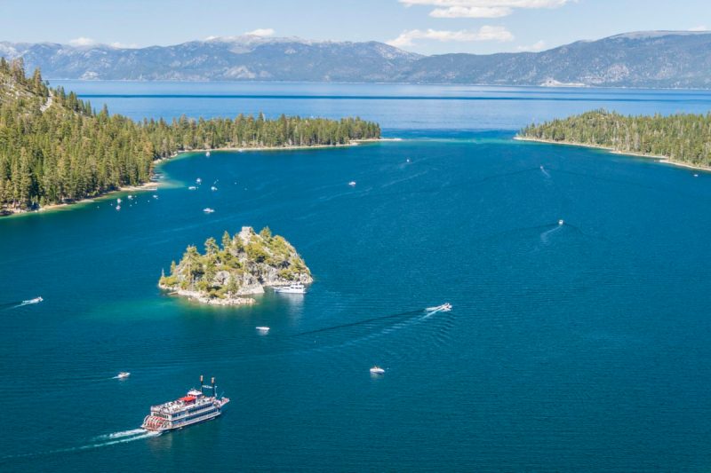 an aerial view of the blue water and greenery of nevada's Zephyr Cove